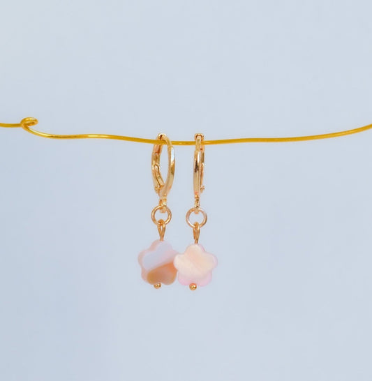 huggie hoop earrings with flower bead charm